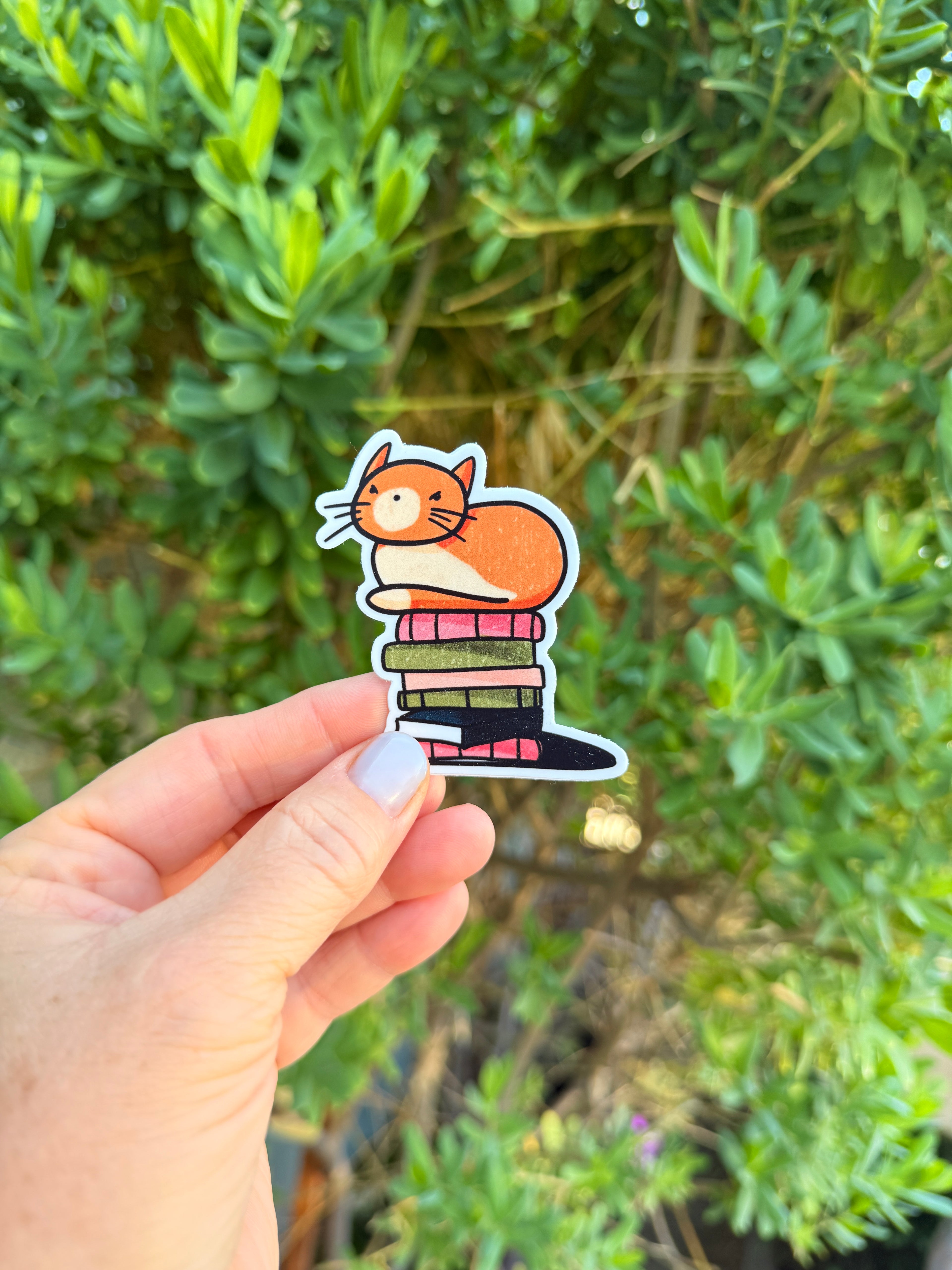 Cat Loaf on Books Sticker