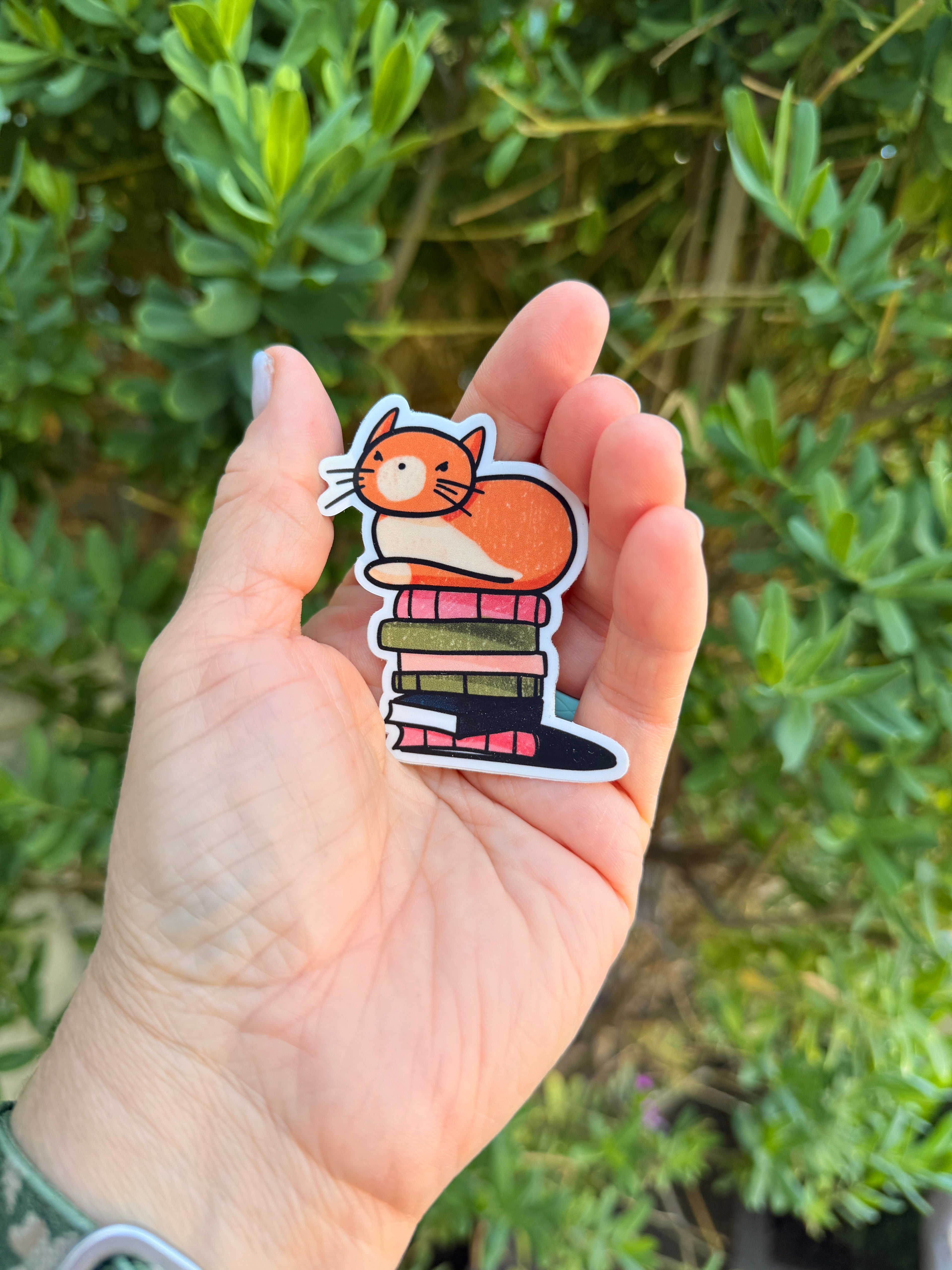Cat Loaf on Books Sticker