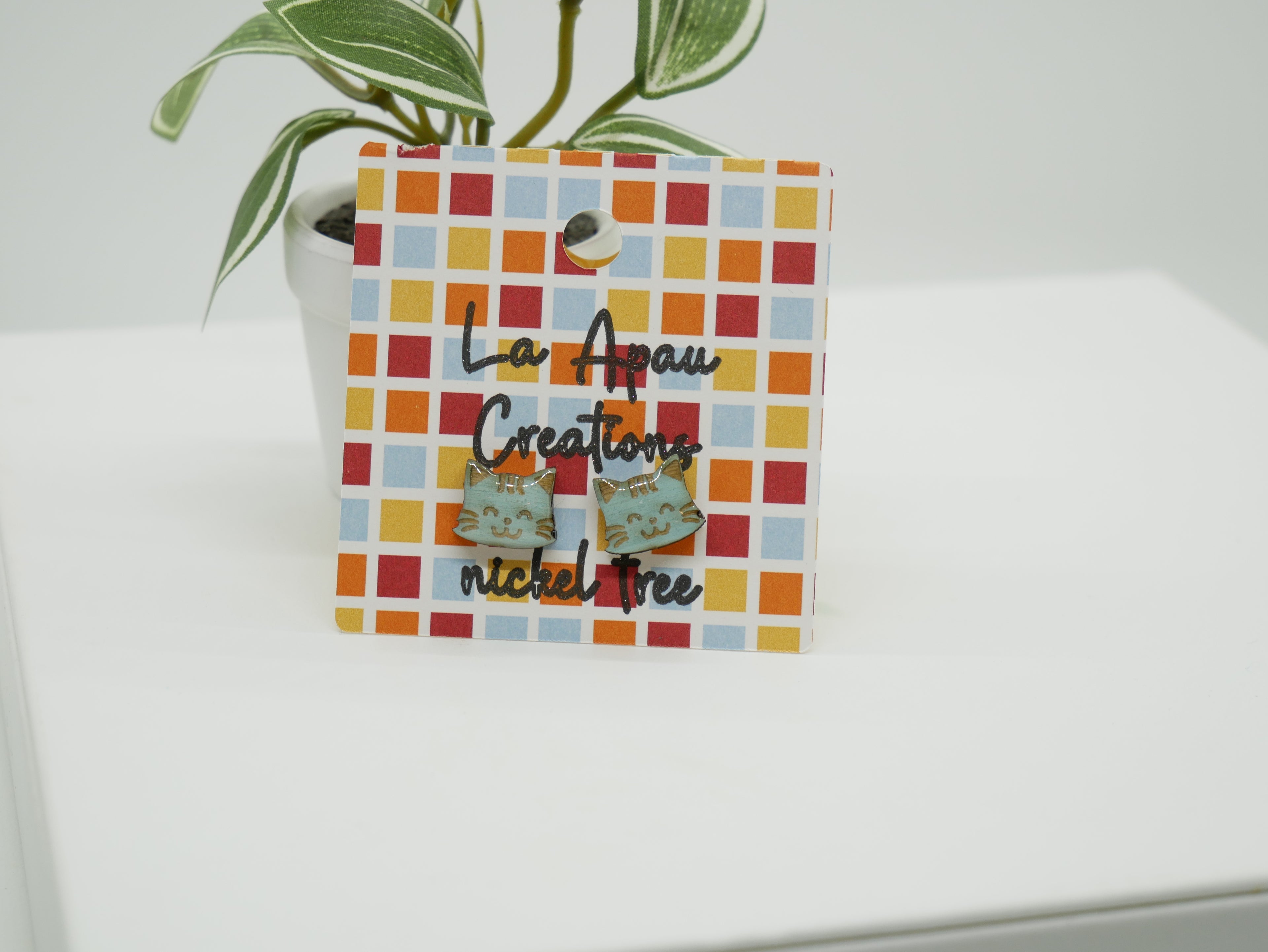 Fundraiser: $10 from every pair of laser-cut cat earrings supports Bill Spencely’s recovery.