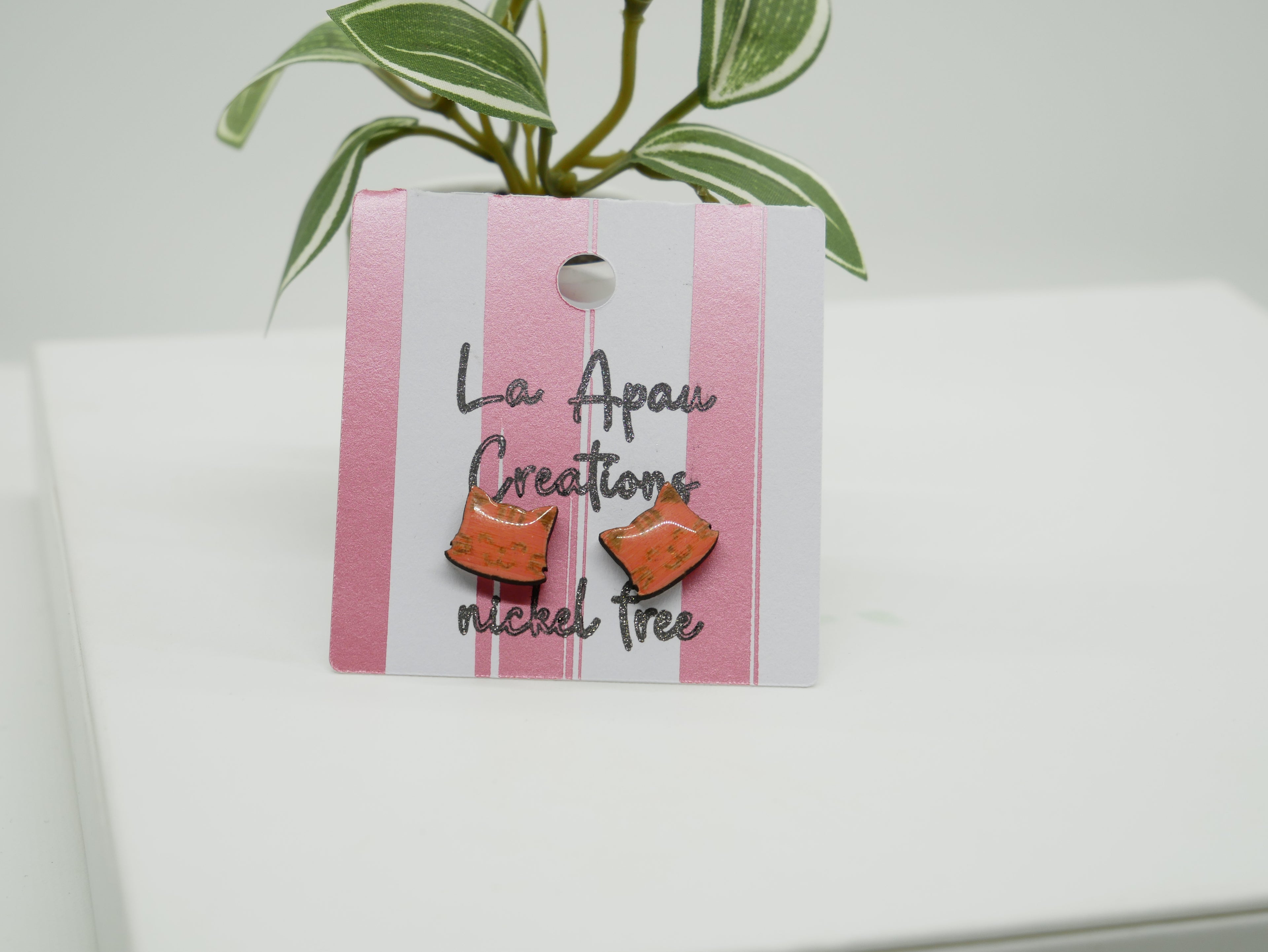 Fundraiser: $10 from every pair of laser-cut cat earrings supports Bill Spencely’s recovery.