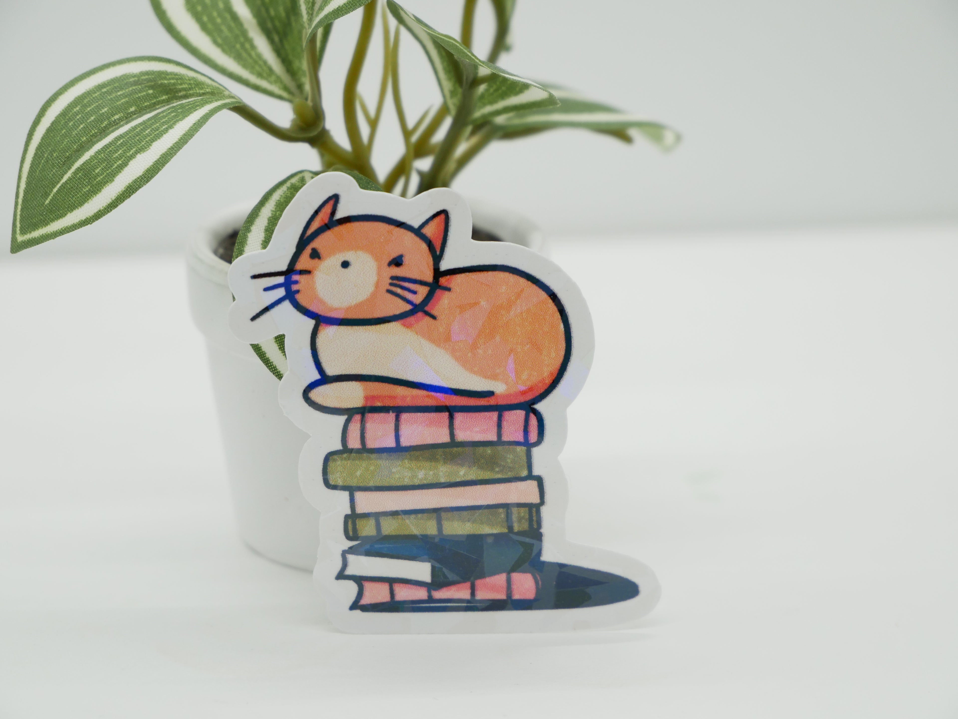 Simba Loaf on Books Holographic Sticker
