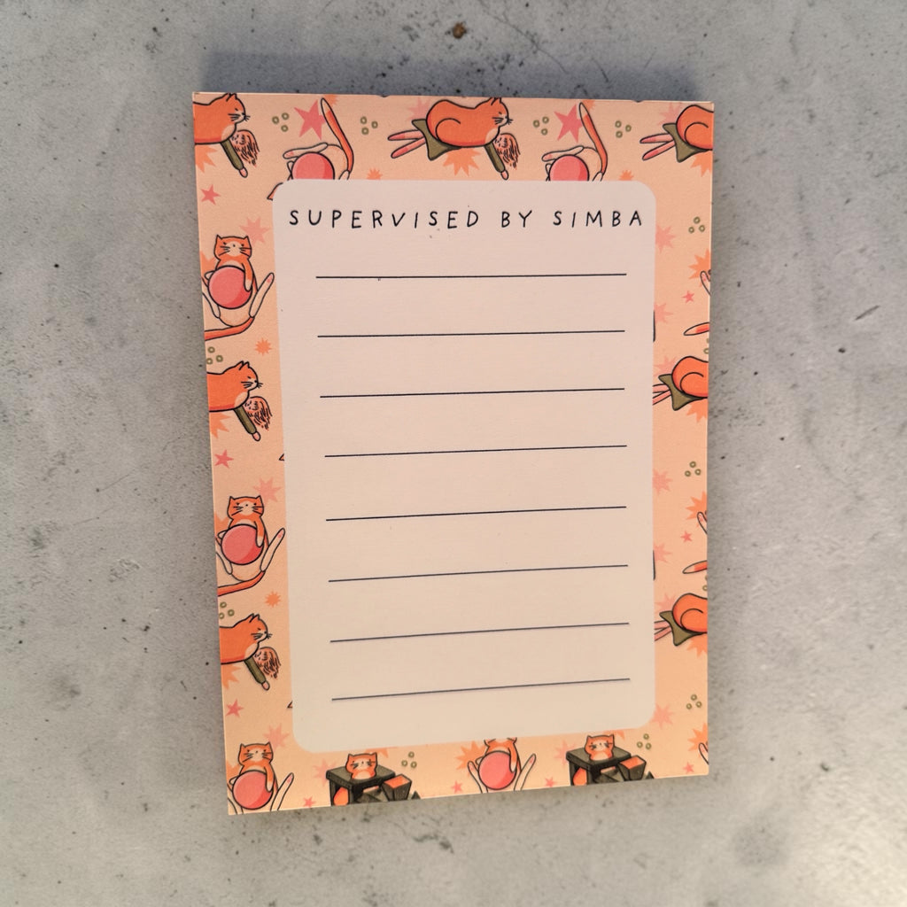 Orange Cat with Toys Notepad